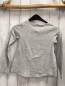 Preview: H&M  Langarmshirt  Gr. 134  grau Pailettenherz mit Gesicht 