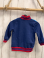 Preview:   Sweatjacke  Gr. 98  hellblau blaue Ärmel Micky Mouse Schrift roter Bund mit blauen Streifen 