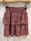Preview:   Rock Gr. 134  lachs schwarze Blumen gesmokter Bund 