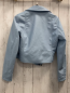 Preview: Reserved  Jacke  Gr. 152/158  helblau lederoptik silber Reißverschlüsse Knöpfe 