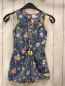 Preview: Miniboden  Playsuit  Gr. 122/128  blau bunte Blumen gelber Bommelbund 