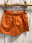 Preview:   Shortsrock  Gr. 128  orange mit Gürtel 