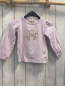 Preview: Steiff  Langarmshirt  Gr. 98  heller lavendelton Bär Schrift mit Blumen 
