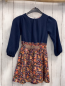 Preview: Tisfaja  Kleid  Gr. 110  blaues Oberteil grauer Rck mit buntem Ornamntdruck 