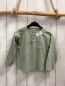 Preview: reserved Langarmshirt Gr. 104  mint Brusttasche