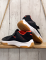 Preview: Puma  Boots  Gr. 40  schwarz orange weiße Sohle 