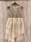 Preview:   Kleid  Gr. 116  weißes Oberteil mit silber goldenen Pailetten Tüllüberrock 