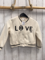 Preview: Zara  Sweatjacke  Gr. 116  creme schwarzer Bund schwarze Schrift 