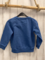 Preview:   Pullover  Gr. 116  blau schwarzer Dino Schrift 