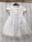 Preview: neu  Kleid  Gr. 122  weißes Oberteil mit Blumenstickerei + Pailetten 3 lagiger Tüllüberrock mit Rosetten 