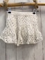 Preview: Zara  Rock Gr. 128  weiß Lochmuster mit Innenshorts 