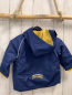 Preview:   Regenjacke  Gr. 104  blau gelbe Schrift + Bund 