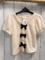 Preview: Rachel Zoe Pullunder Gr. 110  beige Strick schwarze Schleifen