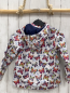 Preview:  Regenjacke Gr. 122  weiß blaue Punkte Schmetterlinge