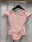 Preview: Bloch Sportanzug  Gr. 116  rosa mit Netzbereichen mit bronze Sternblumen 