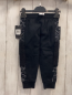 Preview: neu Nike  Jogginghose  Gr. 92  schwarz rote Schrift schwarzer seitlicher Plüschstreifen weiße Strich 