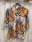 Preview:   Kleid  Gr. 104  weiß Hunde Gebäude schwarz weiße Karos 