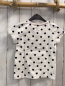 Preview:   T-Shirt Gr. 122  weiß schwarze Punkte Minnie Mouse Kopf mit roter Schleife