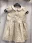 Preview:   Kleid  Gr. 86  creme goldene glänzende Punkte Kragen 