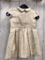 Preview:   Kleid  Gr. 86  creme goldene glänzende Punkte Kragen 