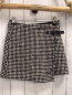 Preview: zara Rock Gr. 140  schwarz weiß gemustert Schnalle Wickeloptik