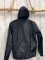 Preview: Champion Regenjacke Gr. 134  schwarz gelber Reißverschluss