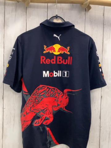 Puma  Sportshirt  Gr. 140  blau Polokragen bunte Schrift 