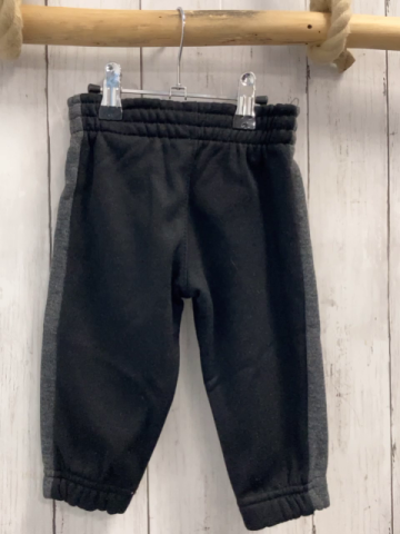 Reebok Jogginghose  Gr. 74  schwarz grauer Seitenstreifen 