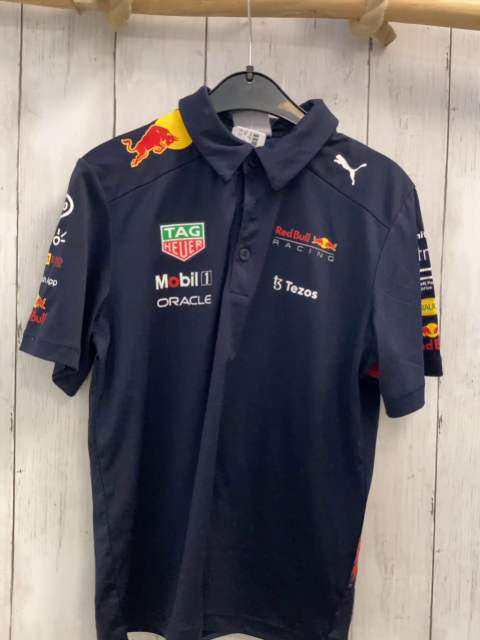 Puma  Sportshirt  Gr. 140  blau Polokragen bunte Schrift 