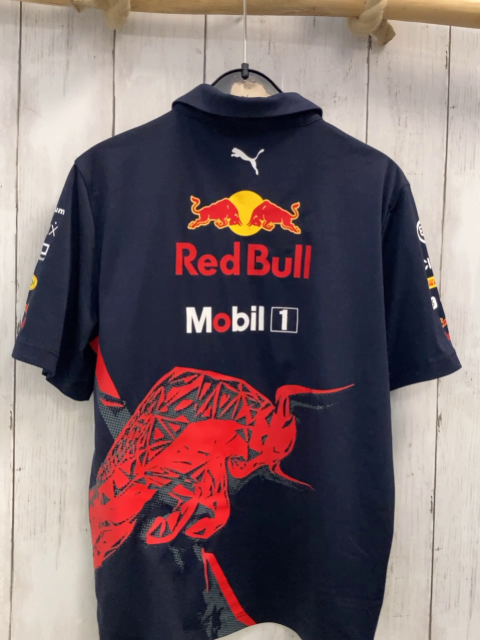 Puma  Sportshirt  Gr. 140  blau Polokragen bunte Schrift 