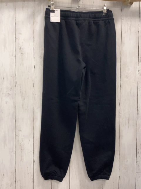 neu Nike  Jogginghose  Gr. 140  schwarz Vorderseie mit Frotteebereiche weißer Seitenstreifen 