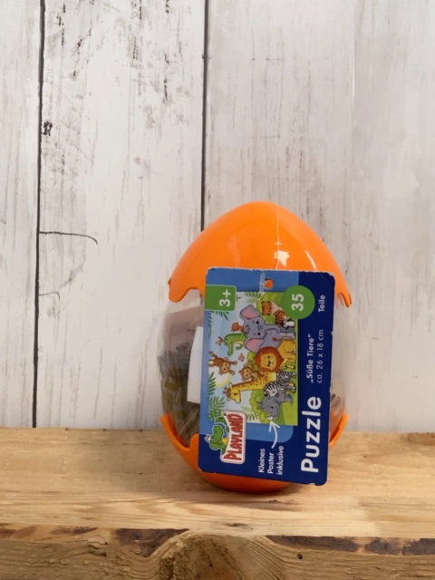 neu  Puzzle  in orange Eiverpackung 