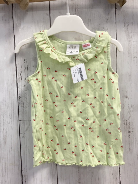 zara Top Gr. 98  hellgrün Kischen Lochmuster