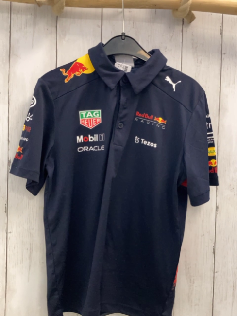 Puma  Sportshirt  Gr. 140  blau Polokragen bunte Schrift 