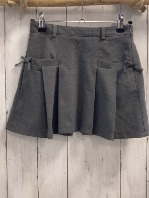 Zara  Rock Gr. 134  grau Taschen mit Schleifen 